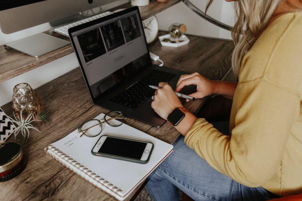 a product owner sitting by the computer