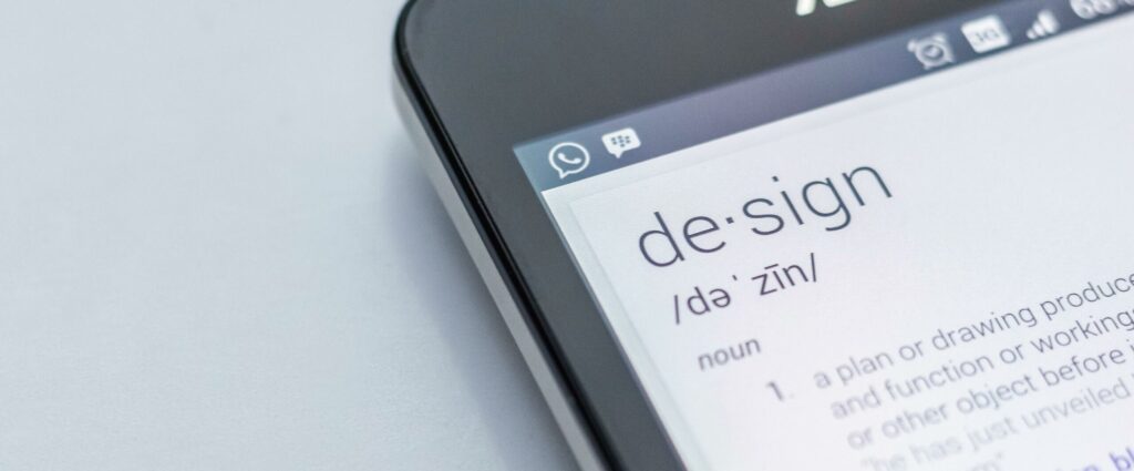 a mobile screen with the definition of desgin